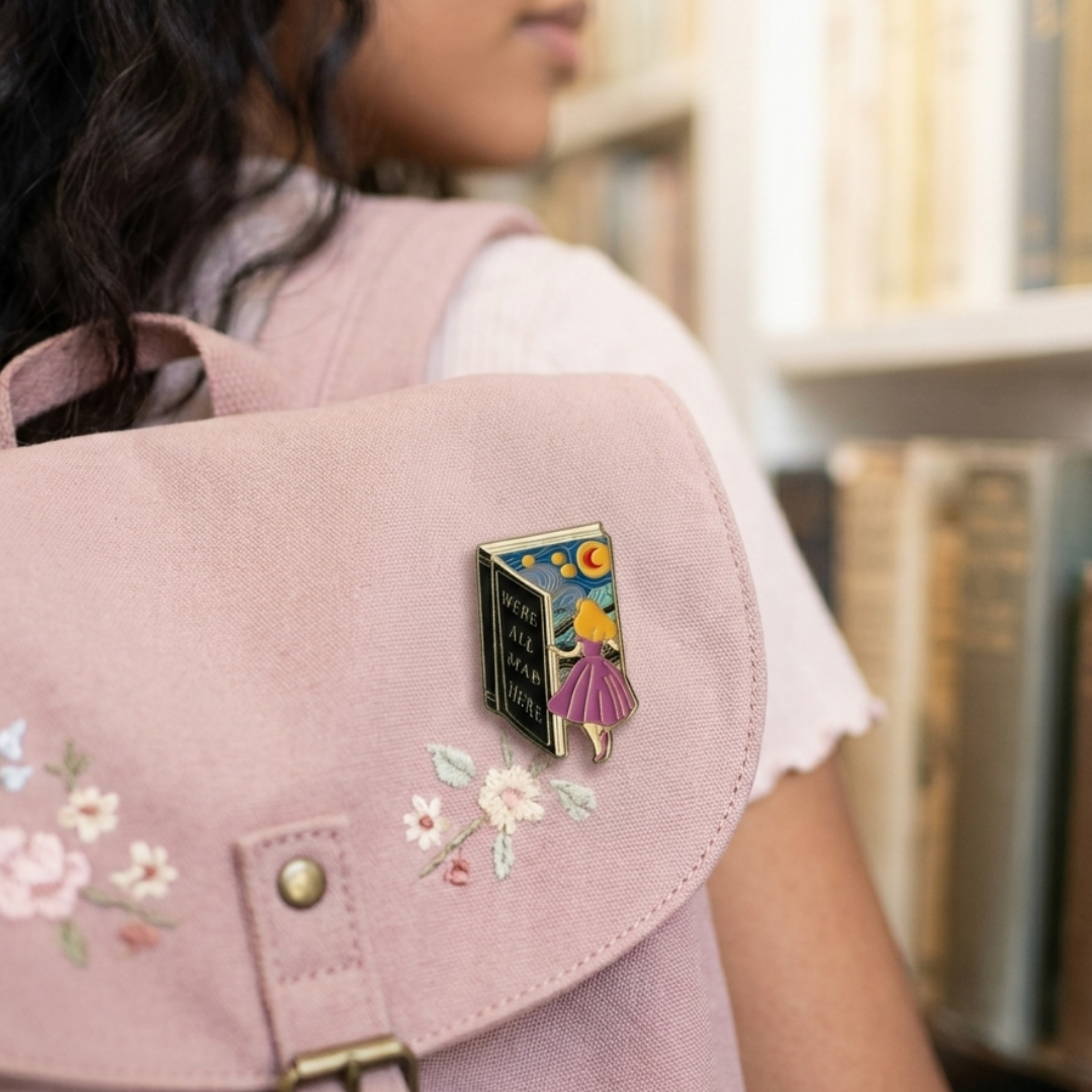 We’re All Mad Enamel Pin